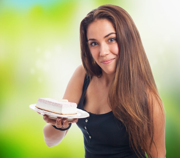 adolescent, girl, tenue, morceau gâteau sur la plaque