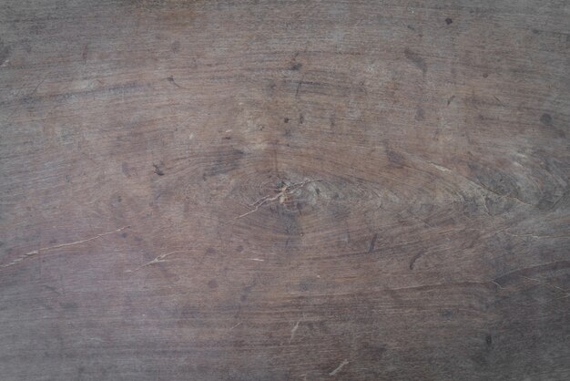 Ancien noeud sur une planche de bois close up