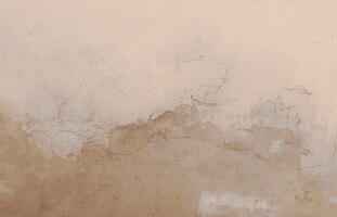 Ancienne texture de mur de couleur crème qui s'écaille