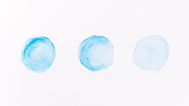 Photo gratuite aquarelle abstraite de formes de lune bleue