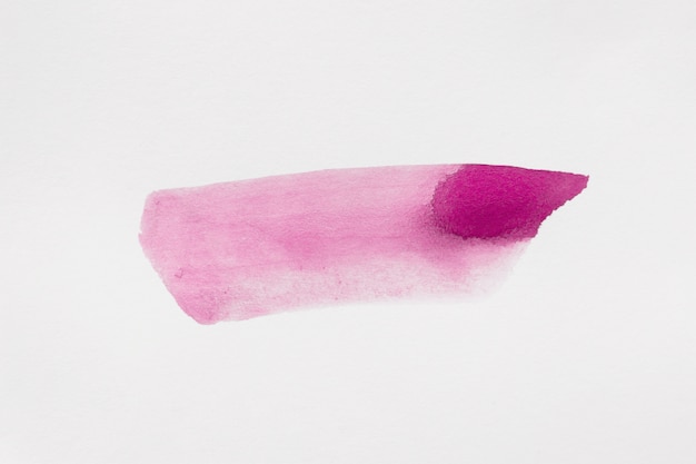 Aquarelle de pinceau rose isolé sur fond blanc