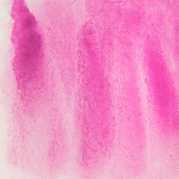 Aquarelle rose texturé sur fond de papier