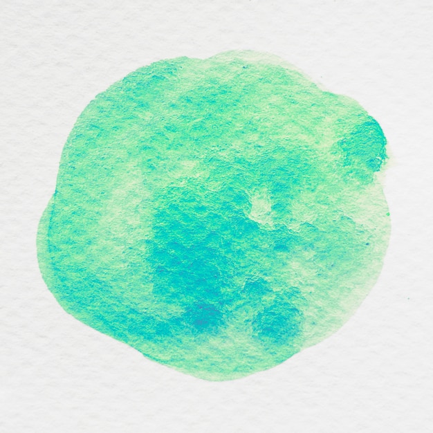 Aquarelle teintée verte sur fond texturé blanc