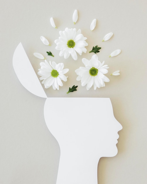 Photo gratuite arrangement du concept d'optimisme avec des fleurs