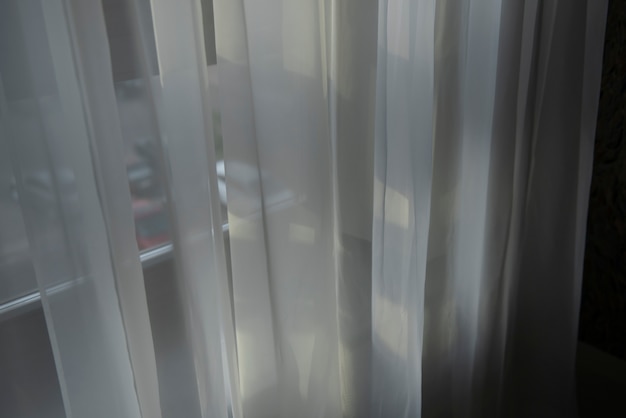 Arrière-plan créatif avec rideau et ombre depuis la fenêtre