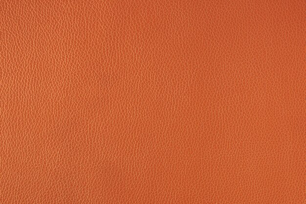 Arrière-plan en cuir fin orange à texture