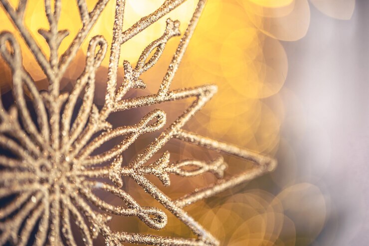 Photo gratuit arrière-plan de noël avec une étoile décorative avec des lumières bokeh