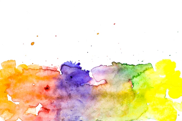 Arrière-plan de taches peintes au pinceau humide multicolore
