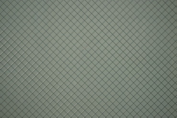 Photo gratuit arrière-plan avec texture de grille métallique