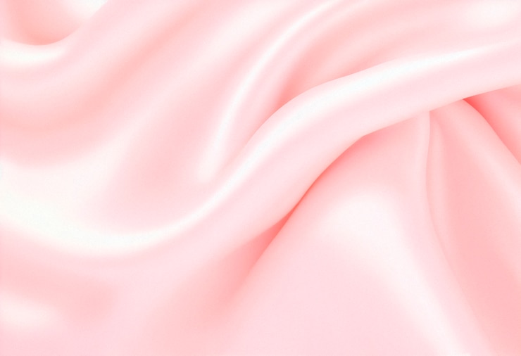 Photo gratuit arrière-plan de texture de tissu de soie rose doux