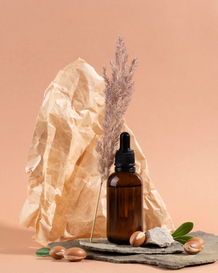 Photo gratuit assortiment d'huile d'argan saine vue de face