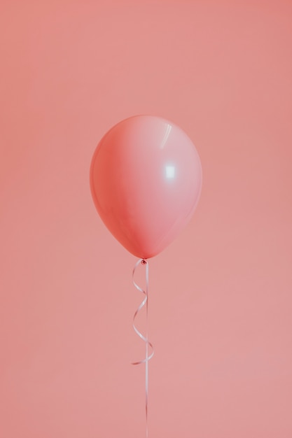 Photo gratuite un ballon rose