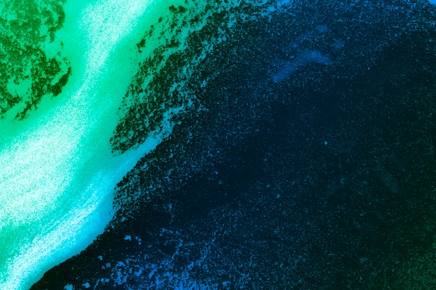 Photo gratuite bande de mousse sur un liquide de couleur dégradée