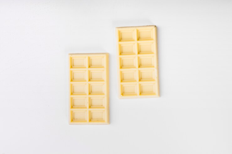 Photo gratuit bâtons de chocolat blanc