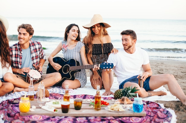 Beach party scene with friends