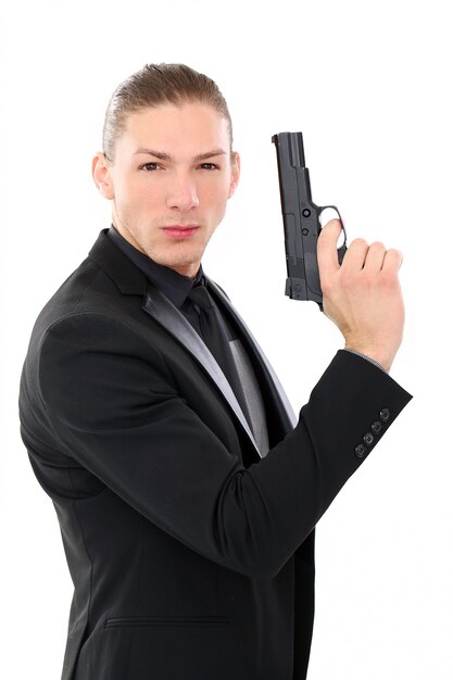 Bel homme avec pistolet