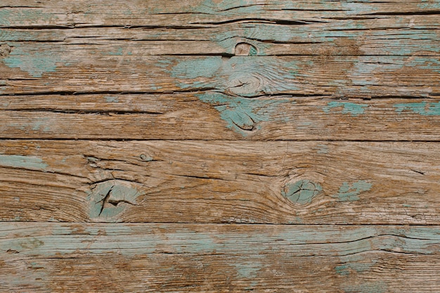 Bois vintage avec surface de peinture turquoise