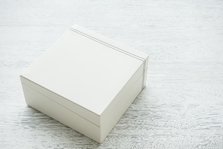 Photo gratuit boîte blanche en cuir