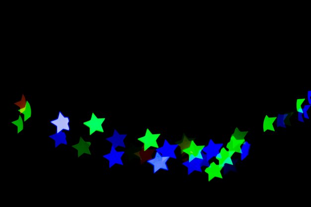 Bokeh abstrait avec des lumières en forme d&#39;étoile