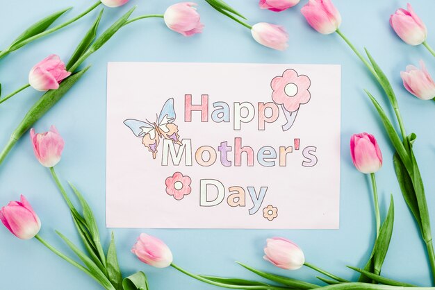 Bonne fête des mères dessin sur papier avec des tulipes roses