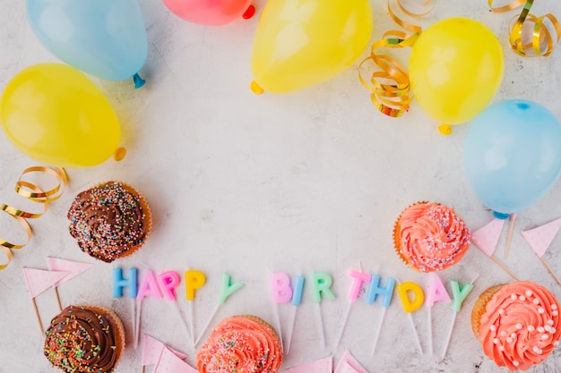 Bordure des ballons et des cupcakes