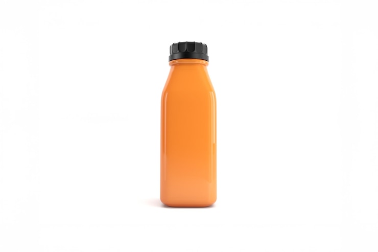 Photo gratuit bouteille de jus d'orange sur fond blanc