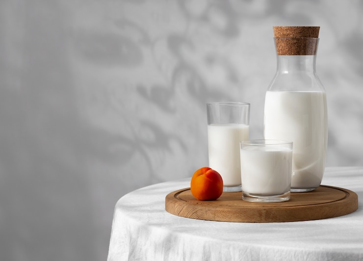 Photo gratuit bouteille de lait en verre classique