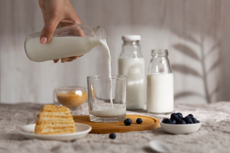 Photo gratuit bouteille de lait en verre classique