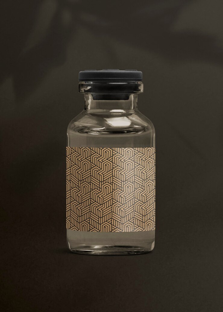 Photo gratuit bouteille en verre d'injection de vitamine avec étiquette brune luxueuse pour l'emballage de produits de santé et de bien-être