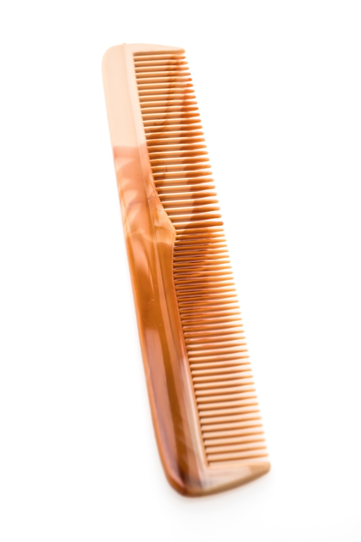Photo gratuit brosse à cheveux ou peigne