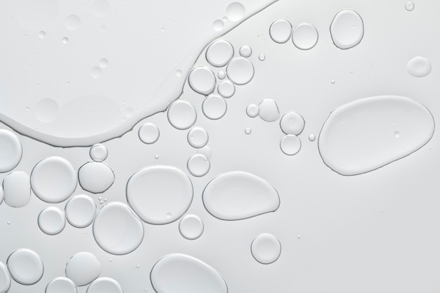 Photo gratuite bulle d'huile abstrait gris dans le papier peint de l'eau