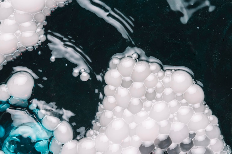 Photo gratuit bulles blanches et bleues sur l&#39;eau