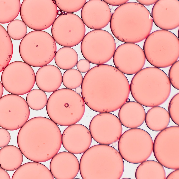 Photo gratuit bulles roses fluides en gros plan