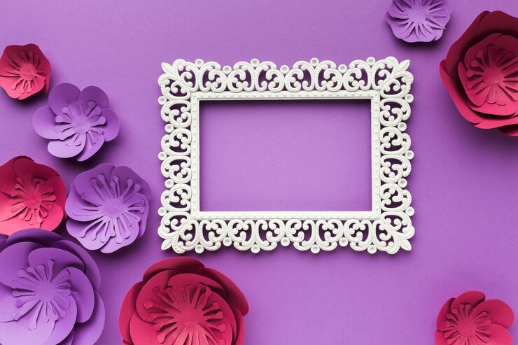 Photo gratuit cadre avec des fleurs en papier coloré