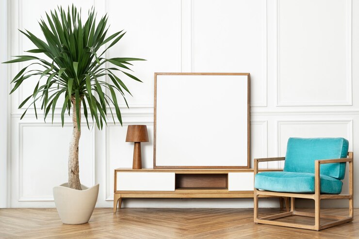 Photo gratuit cadre photo sur une armoire avec un intérieur de maison scandinave