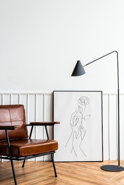 Photo gratuite cadre photo avec dessin au trait par une lampe dans un salon