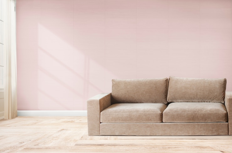 Photo gratuit canapé dans une chambre rose