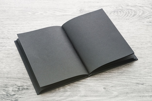 Cahier noir photo stock. Image du entier, objet, personne - 1373024