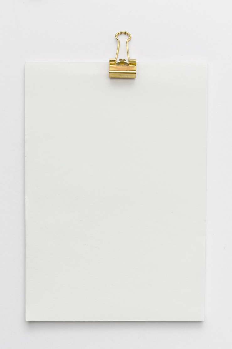 Photo gratuit carnet de notes avec trombone