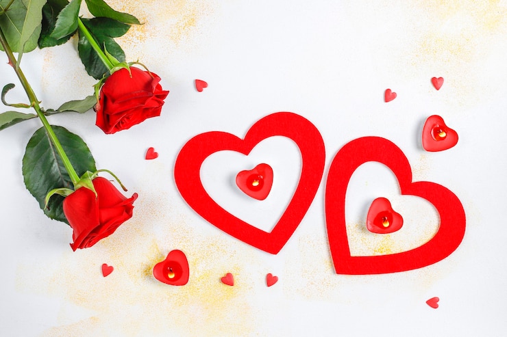 Photo gratuit carte de voeux de saint-valentin avec des fleurs roses.