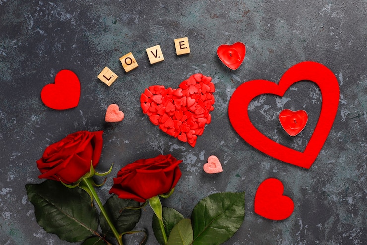 Photo gratuit carte de voeux de saint-valentin avec des fleurs roses.