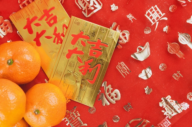 cartes d&#39;or pour célébrer l&#39;année chinoise avec tangerines