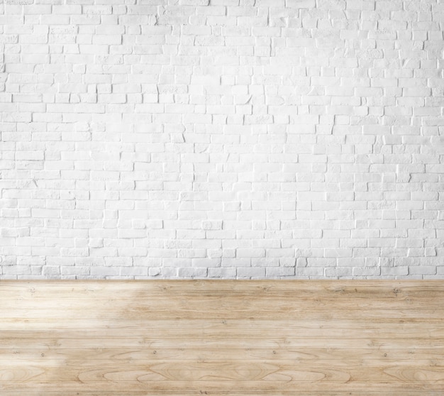 Chambre faite de mur de briques et de plancher en bois