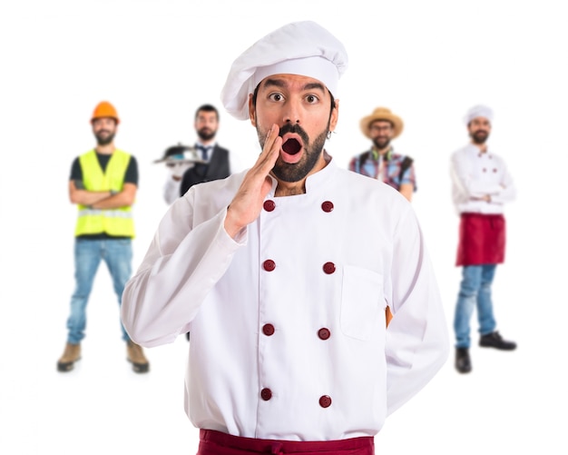 Photo gratuite chef faisant un geste de surprise sur fond blanc