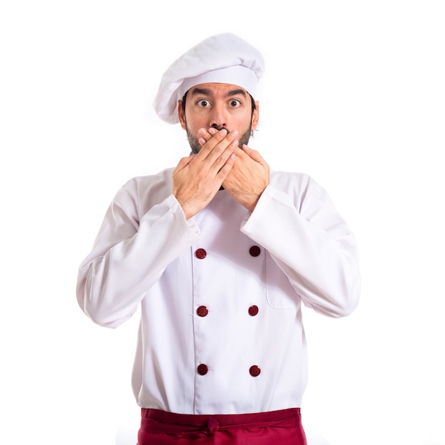 Chef faisant un geste de surprise sur fond blanc