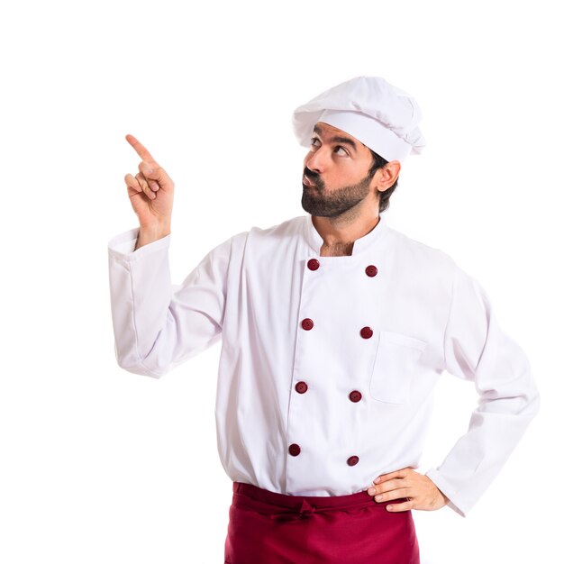 Chef pensant au fond blanc