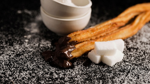 Churros et sucre en cubes