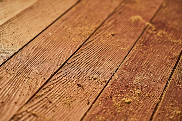 Close-up de planches avec du sable