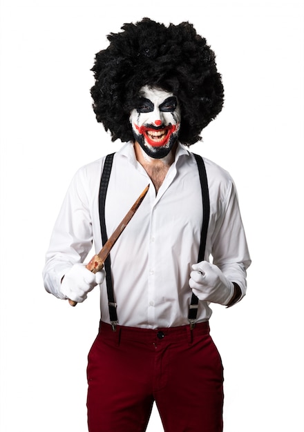 Photo gratuite clown assassiné avec un couteau