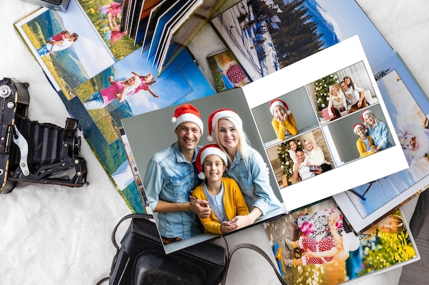 Collage de photos de neuf images avec concept d'hiver. Saison des fêtes. Livre photo ouvert avec des photos de Noël